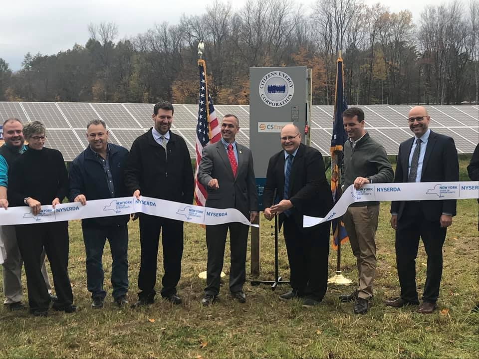 Smullen cutting ribbon